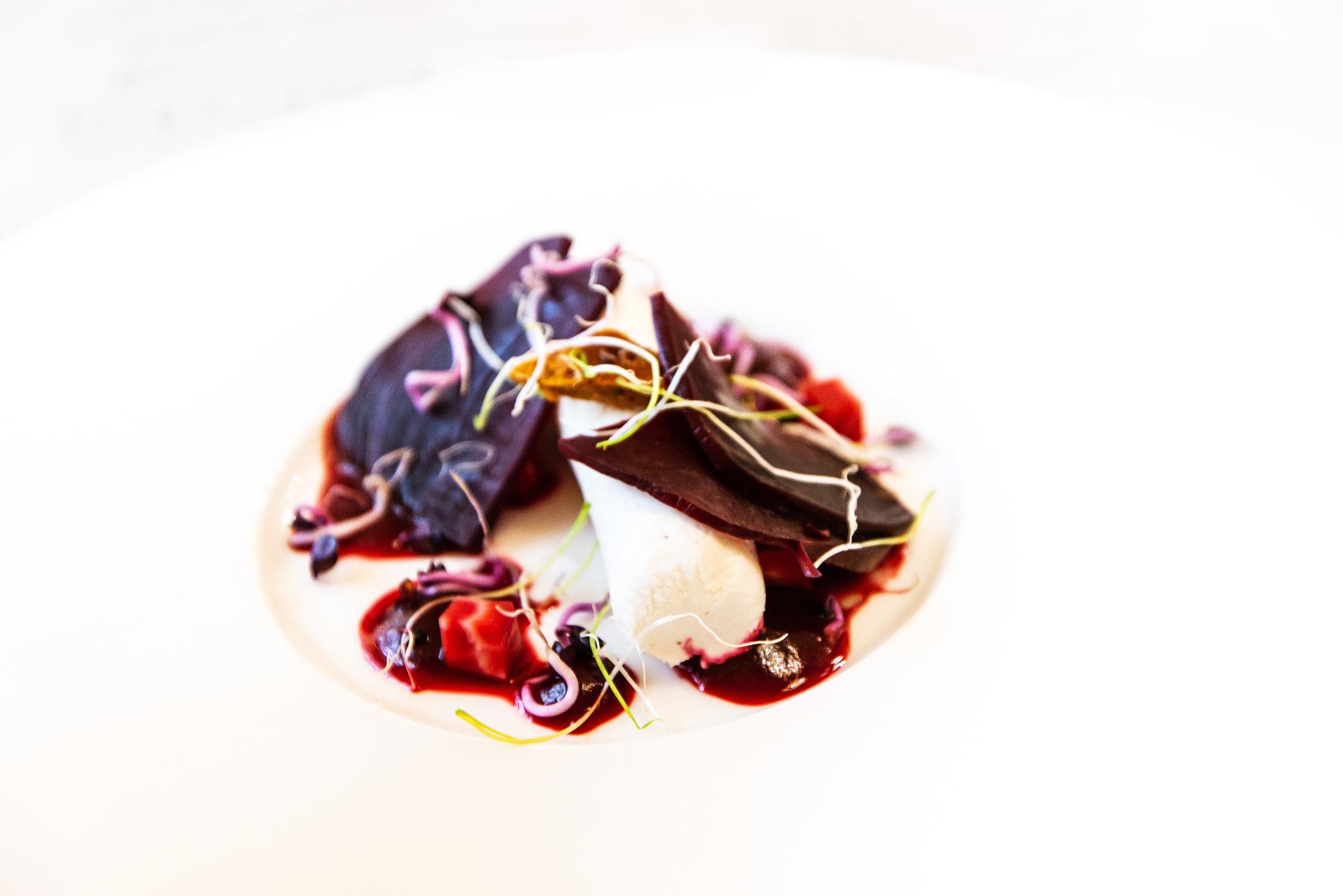 Close-up plated dish with modern garnish